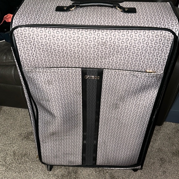 Guess soft material large suitcase used twice only don’t need anymore. - Picture 1 of 3
